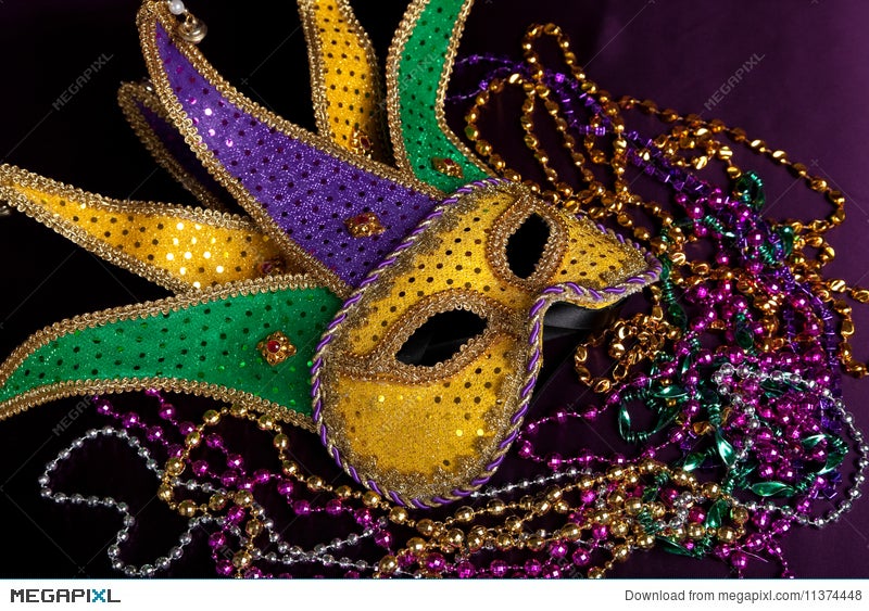 Mardi Gras Mask And Beads On A Purple Background Stock Photo Mardi Gras Mask And Beads On A Purple Background
