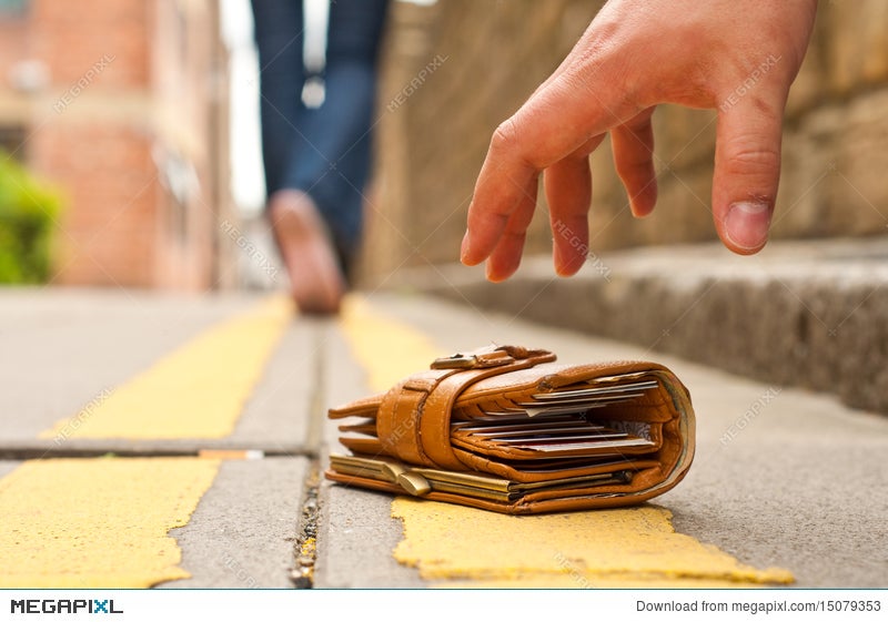 Guy Picking Up A Lost A Lost Purse Wallet Stock Photo 15079353 Megapixl