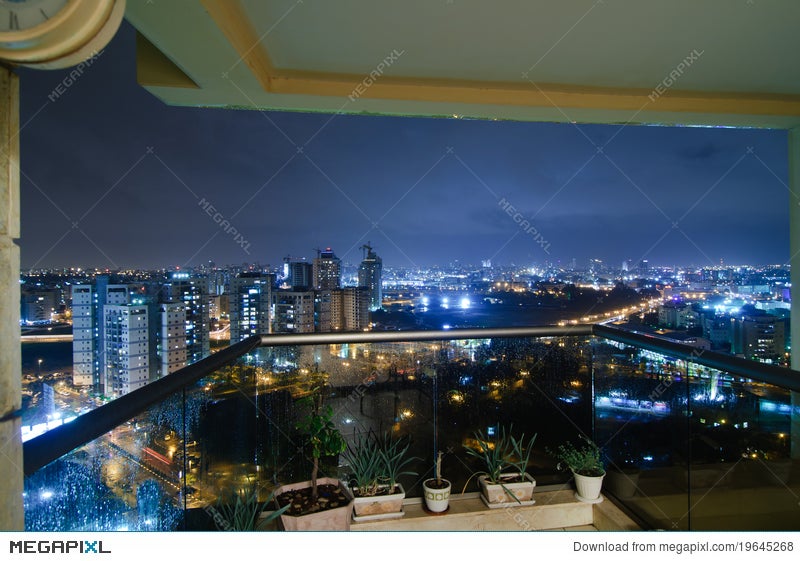 Night Rainy City View From Balcony Stock Photo Megapixl