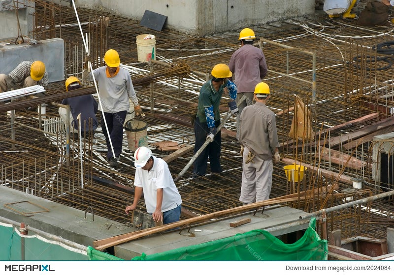 Construction Workers At High Rise Building Stock Photo Megapixl