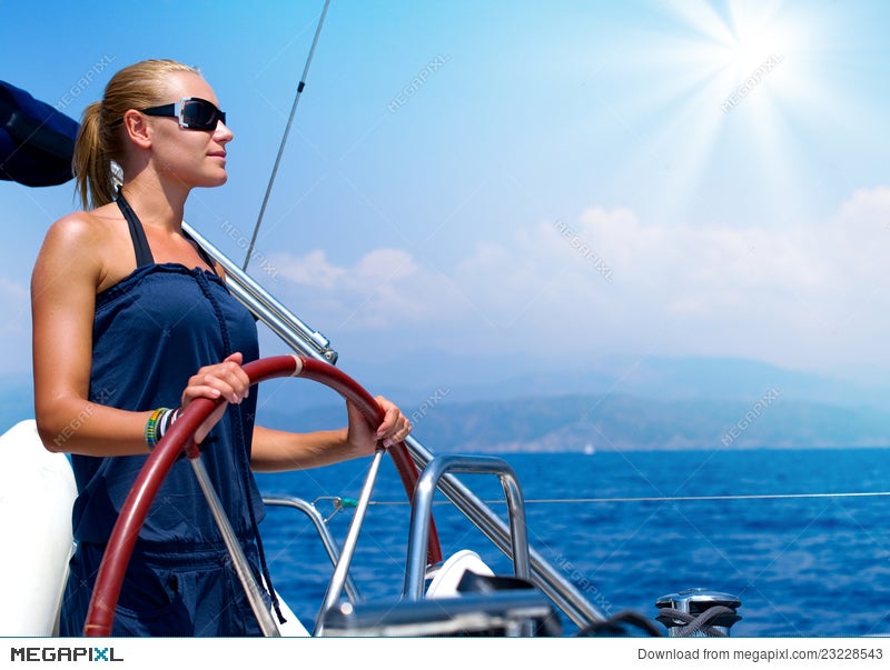 Girl Sailing A Sailboat Stock Photo Megapixl