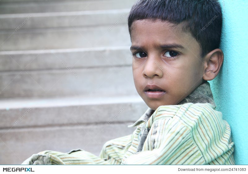 Indian Little Boy Posing to Camera Stock Photo