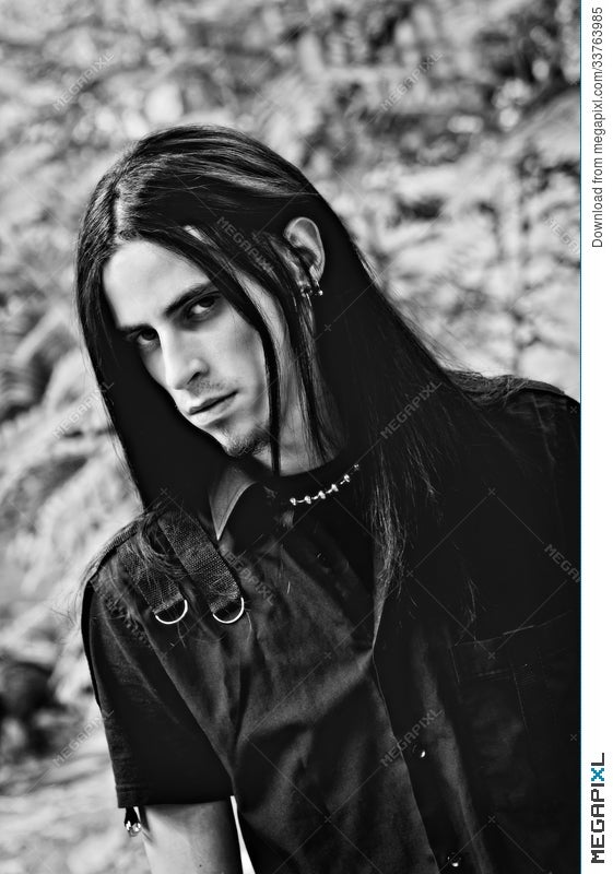 Portrait Of A Handsome Young Man With Long Hair Black And White