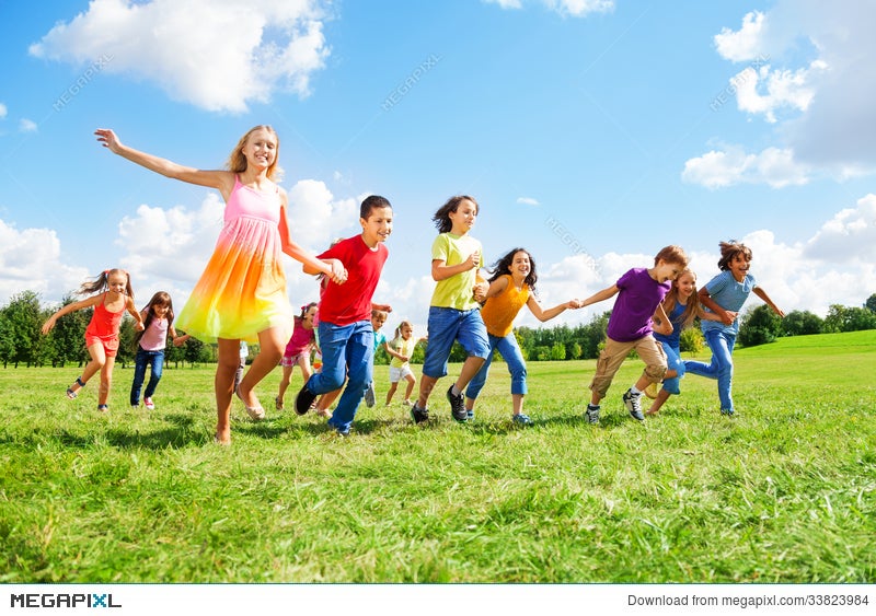 Large Group Of Kids Running In The Park Stock Photo Megapixl