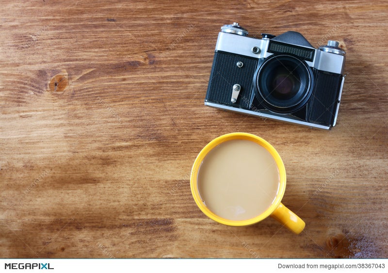 top view of old camera cup of coffee and book stock photo 38367043 megapixl old camera cup of coffee and book stock