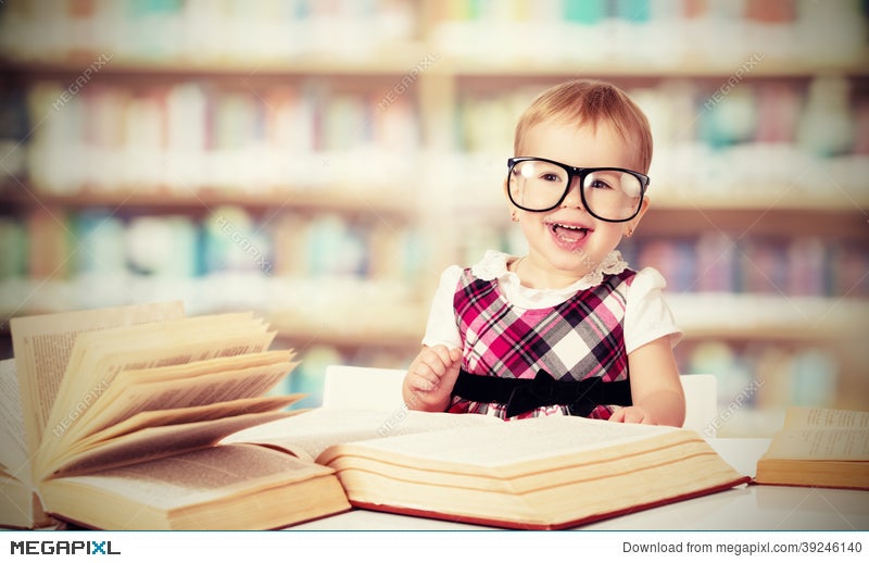 Funny Baby Girl In Glasses Reading Book In Library Stock Photo 39246140 -  Megapixl