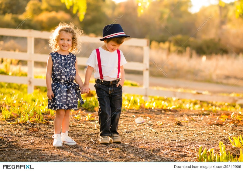 Boy And Girl Holding Hands Stock Photo Megapixl