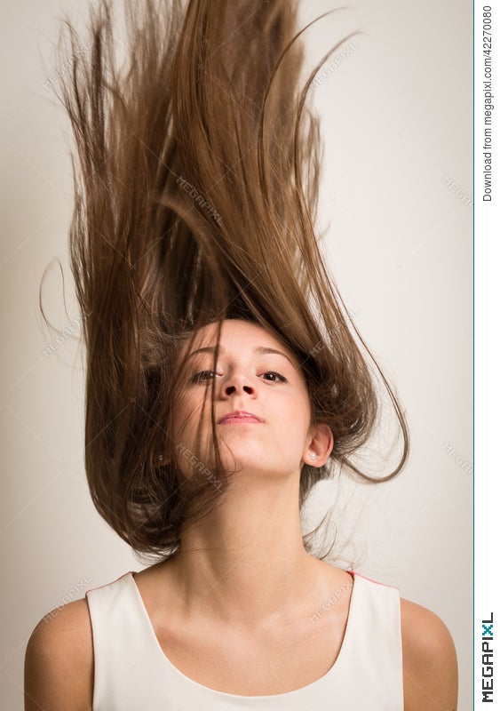 Woman Flipping Her Hair Up Stock Photo 42270080 - Megapixl