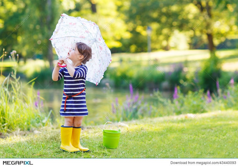 little girl umbrella and boots