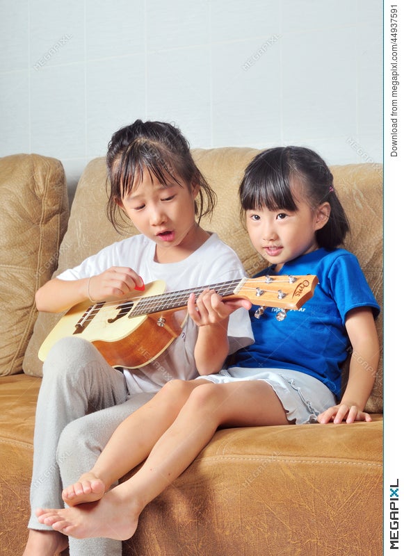two asian girls singing Two asian girls singing