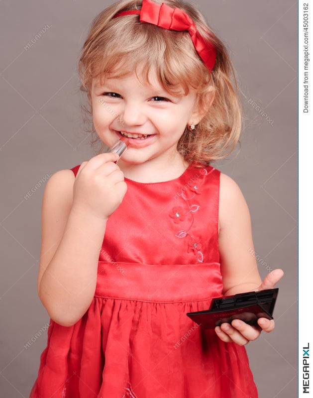 Cute Baby Girl Doing Makeup Stock Photo 45003162 Megapixl Cute Baby Girl Doing Makeup Stock Photo