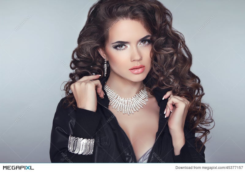 Attractive Brunette Girl Model With Long Wavy Hair Styling Make