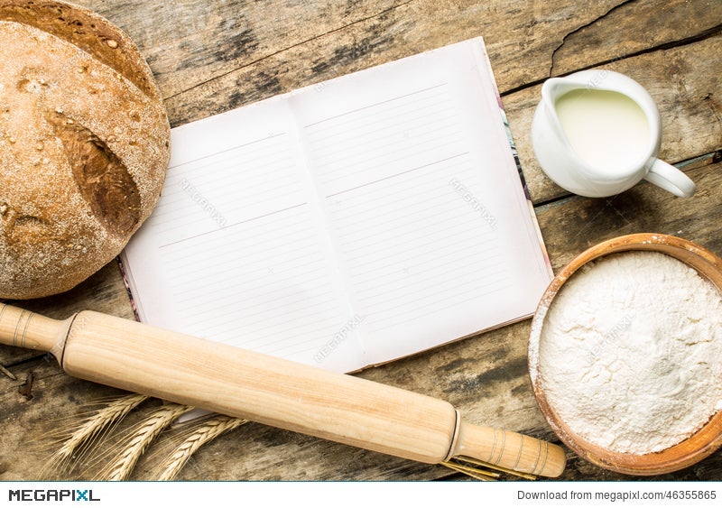 Opened Cookbook With Bakery Background Stock Photo Megapixl