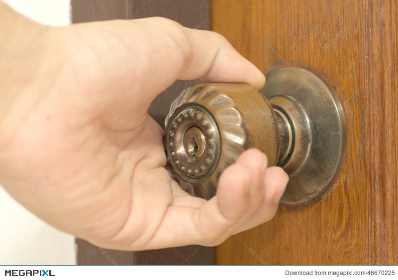 Closeup Of Male Hand Opening Door Knob Stock Photo 46670225 Megapixl