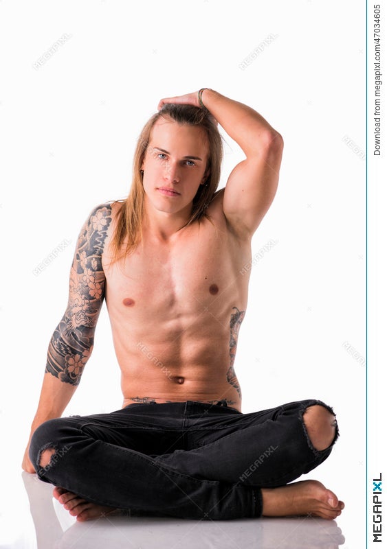 Beautiful Young Long Haired Man Shirtless Sitting On The Floor