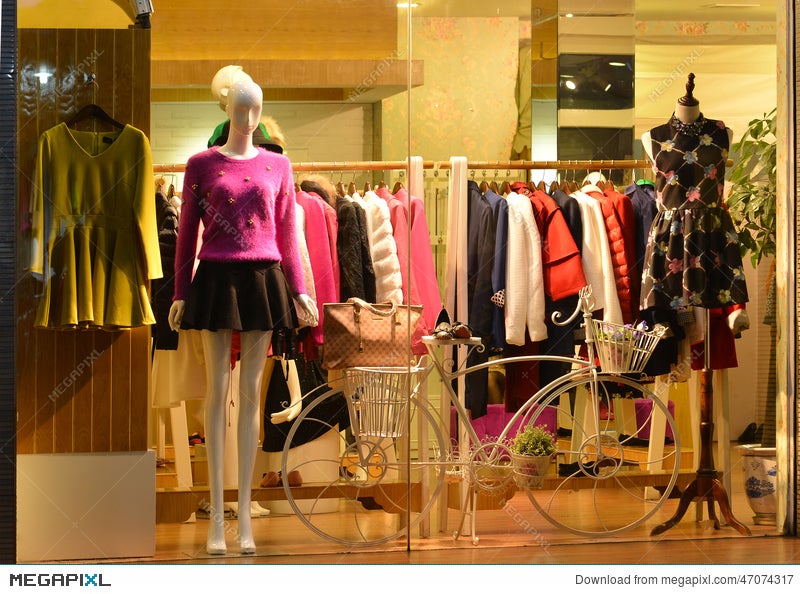 Store Display Window Light And Decorative Bike Fashion Boutique With Mannequins Store Display Window Light And Decorative Bike Fashion Boutique With Mannequins