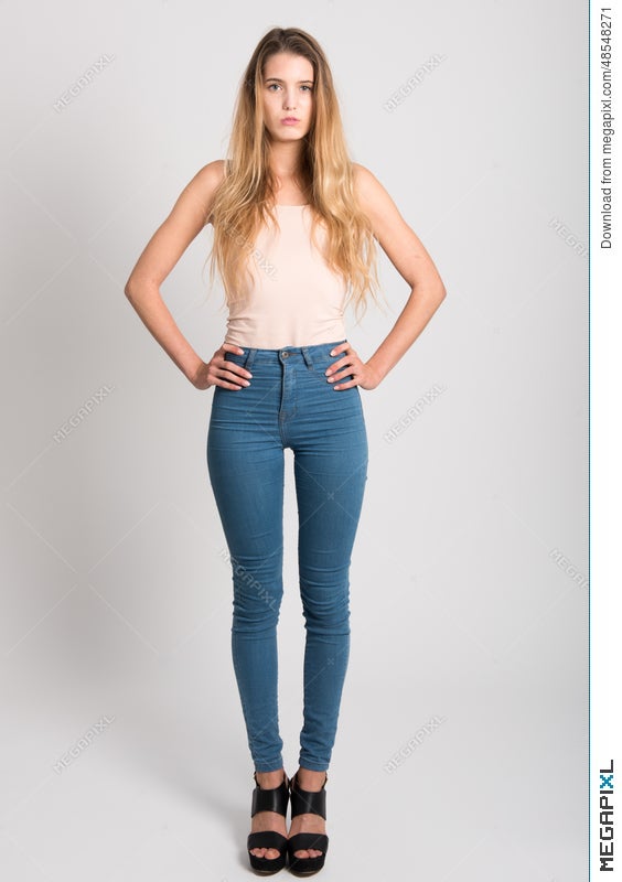 Inca Empire pølse Mutton Blonde Girl Wearing Blue Jeans And T-Shirt. Studio Shot Stock Photo  48548271 - Megapixl
