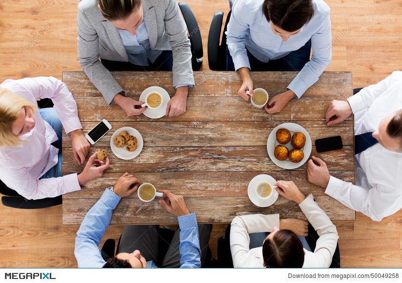 Close Up Of Business Team Drinking Coffee On Lunch Stock Photo Megapixl