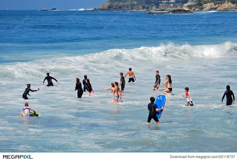 Children Playing In The Surf Of Sleepy Hollow Beach Laguna Children Playing In The Surf Of Sleepy Hollow Beach Laguna California