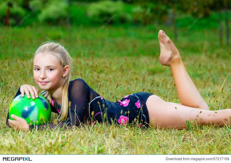 Outdoor Portrait Of Young Cute Little Girl Gymnast Stock Photo Megapixl