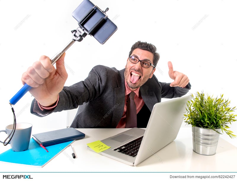 Funny Businessman At Office Desk Taking Selfie Photo With Mobile Phone  Camera And Stick Stock Photo 62242427 - Megapixl
