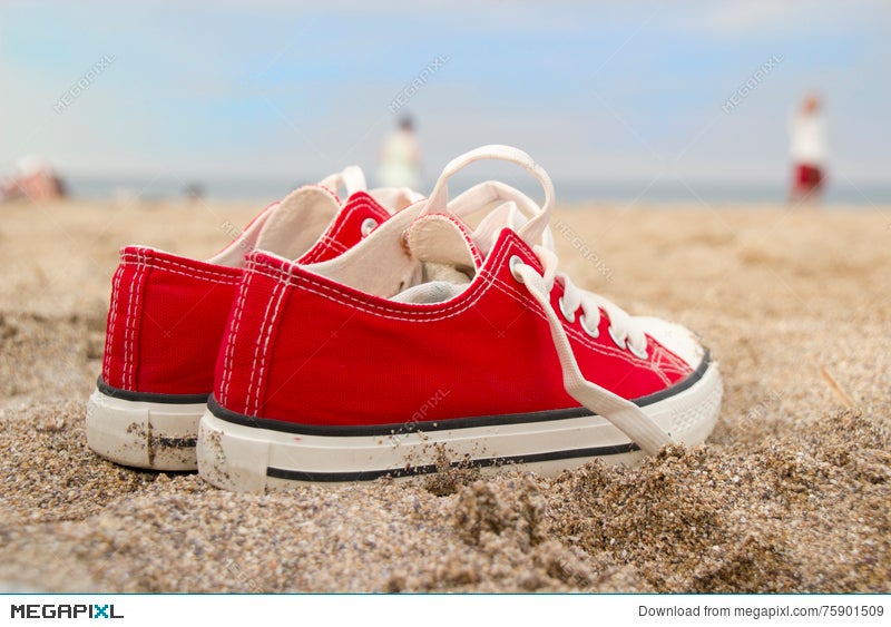 sneakers on beach