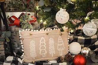 Christmas Tree Pillow Displayed Under Tree