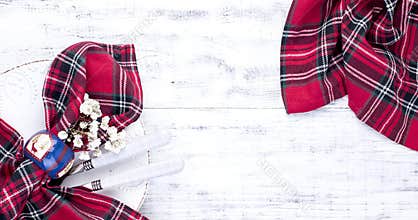 Cutlery, tablecloths and napkins for celebrating Christmas. Free space for text