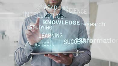 Knowledge, information, research, school, book word cloud made as hologram used on tablet by bearded man, also used