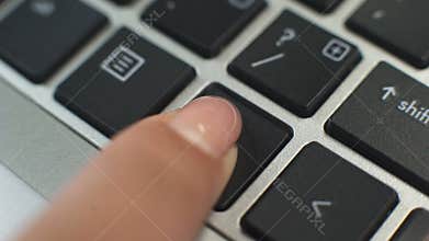 Female hand pressing control key to perform special operation with pc programs