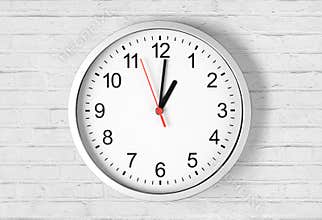 Clock or watch on brick wall