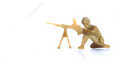 Soldier with machine gun pose