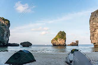 Two tents on the beach with Beautiful Rocks view. Morning at Nui Bay Beach, Phi-Phi, Thailand, Krabi province Andaman