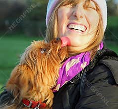 Mummy getting doggy kisses with wet tongue