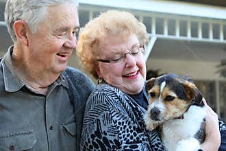 Elderly Couple with Dog