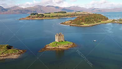 Aerial of the historic castle Stalker in Argyll, Scotland
