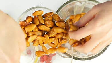 Preparation of almond milk cocktail, mixing ingredients in a blender. healthy lifestyle concept. 4K