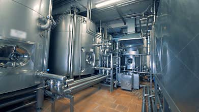 Distillery equipment and pipeline system in a factory facility