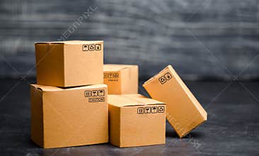 Cardboard boxes. The concept of packing goods, sending orders to customers. Warehouse of finished products and equipment. Moving