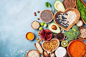 Healthy food background from fruits, vegetables, cereal, nuts and superfood. Dietary and balanced vegetarian eating products