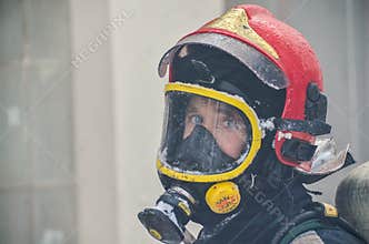 Firefighter with frozen uniform