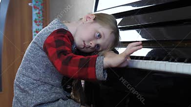Young 5 Year Old Girl Bored Study Playing the Piano