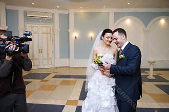 Happy bride and groom on solemn registration