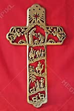 Nativity Cross on red Textile