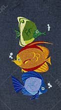 Fish embroidery on material