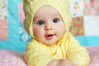 Baby Girl in Hooded Sweater