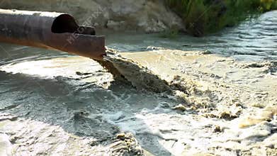 Sand dredging tube. Pipe of sand dredging boat cleaning river bed. Ecological concept