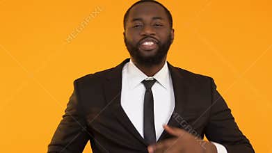 Handsome black business man enjoying luxury suit, ready for important meeting