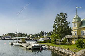 Picturesque yellow holliday houses ArkÃ¶sund Sweden