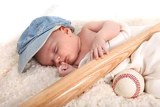 Baby Boy Sleeping With a Baseball Bat and Ball